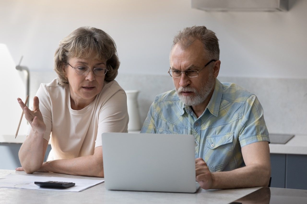 istock-1358295298-mature-couple-laptop-jpg